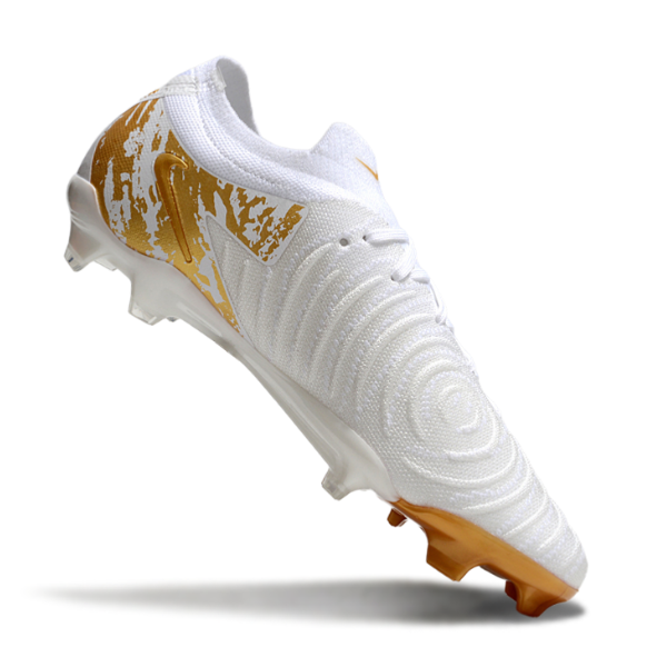 Botas de fútbol Nike Phantom GX2 Elite FG para terreno firme, color blanco y dorado