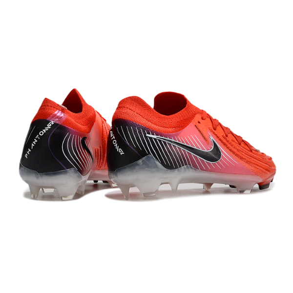 Botas de fútbol Nike Phantom GX2 Elite FG para terreno firme, color rojo y negro