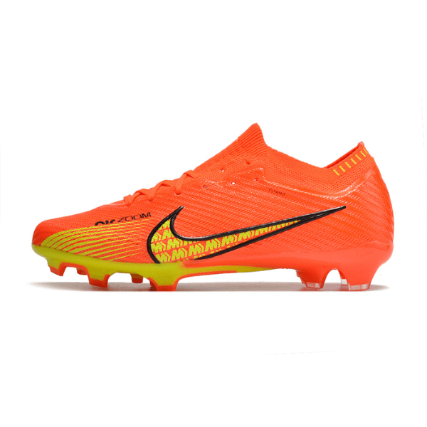 Botas de fútbol Nike Zoom Mercurial Vapor 15 Elite FG para terreno firme, color naranja y amarillo