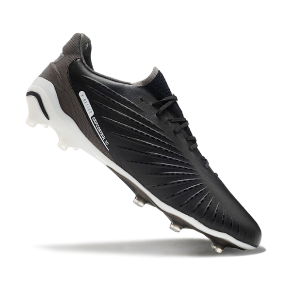 Botas de fútbol Puma King Ultimate Eclipse Pack FG para terreno firme, color negro y gris