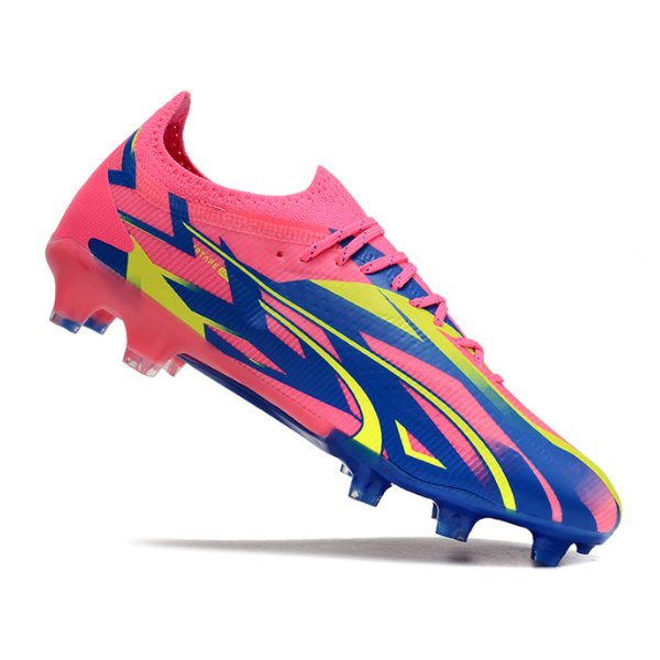 Botas de fútbol Puma Ultra Ultimate rosa y amarillo para terreno firme FG