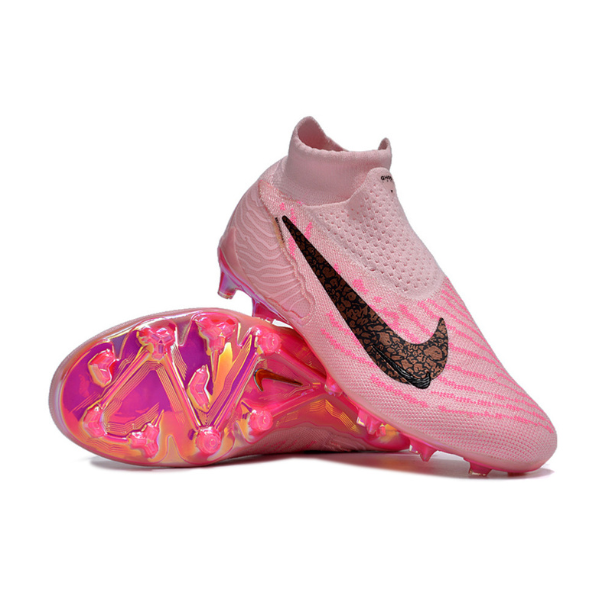 Botas de fútbol Nike Phantom GX Elite DF rosa para terreno firme FG para niños