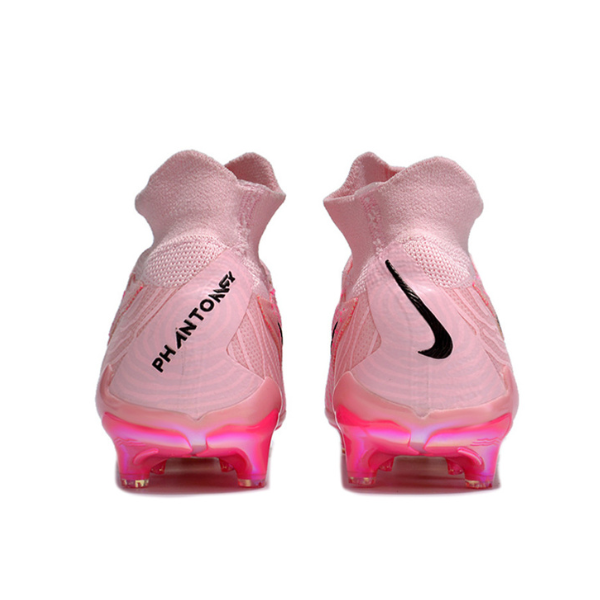 Botas de fútbol Nike Phantom GX Elite DF rosa para terreno firme FG para niños