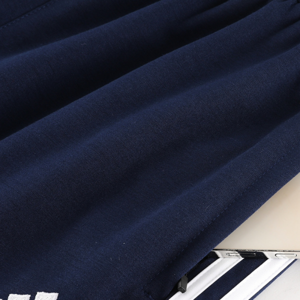 Conjunto de abrigo y pantalón azul frío de Adidas