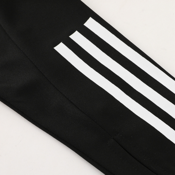 Conjunto de camiseta y pantalones Adidas Cold Set en blanco y negro con cremallera de un cuarto