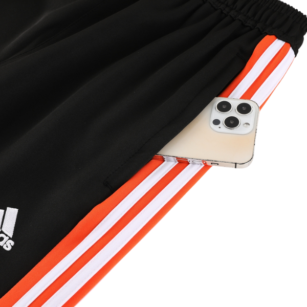 Chaqueta y pantalón Adidas naranja, blanco y negro Cold Set