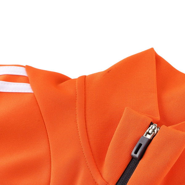 Chaqueta y pantalón Adidas naranja y negro Cold Set