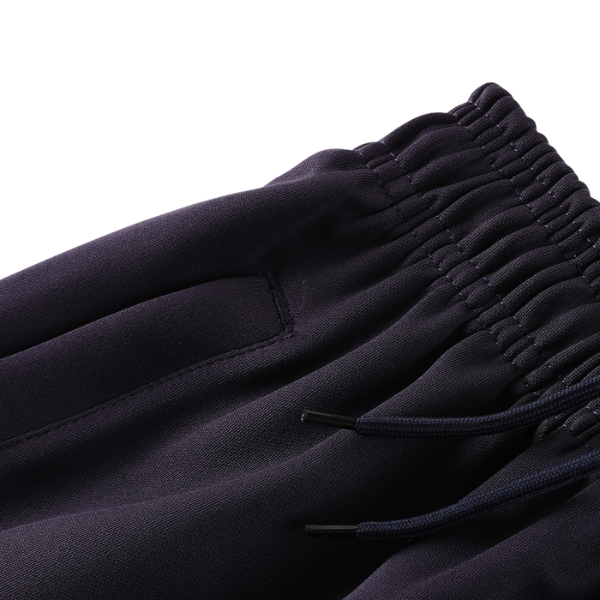 Chaqueta y pantalón Adidas naranja y negro Cold Set