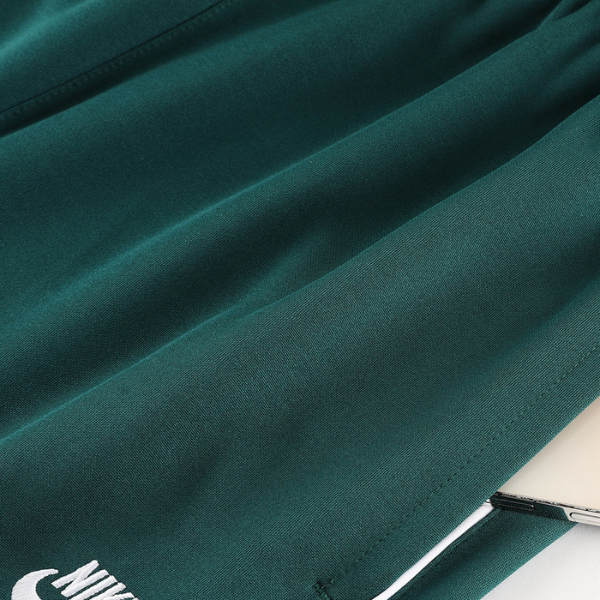 Chaqueta y pantalones Nike verde oscuro Cold Set