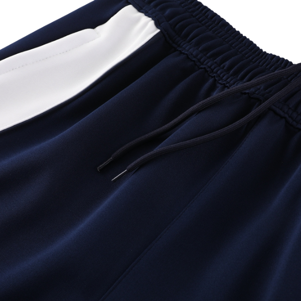 Chaqueta y pantalón Adidas azul y blanco Cold Set