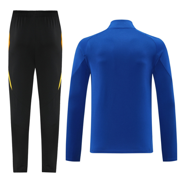 Camiseta y pantalones Adidas Cold Set azul, amarillo y negro con cremallera de un cuarto