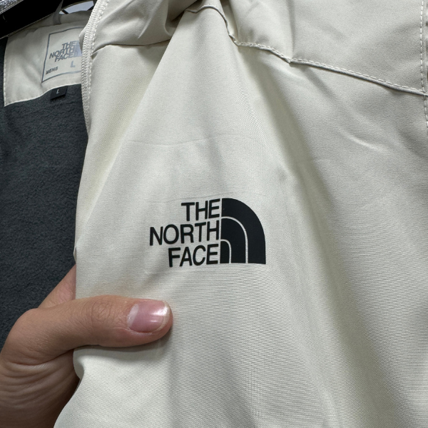 Chaqueta cortavientos beige The North Face