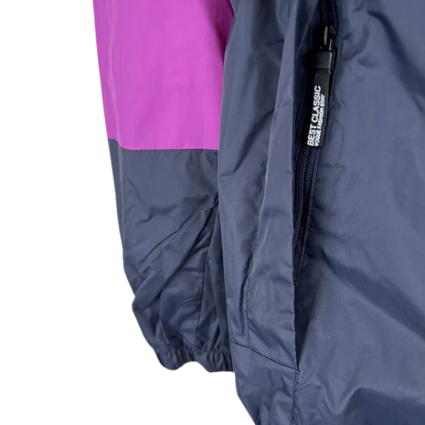 Chaqueta cortavientos The North Face blanca, rosa y azul