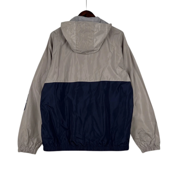 Chaqueta cortavientos gris y azul de Tommy Hilfiger