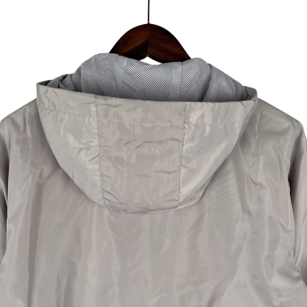 Chaqueta cortavientos gris y azul de Tommy Hilfiger