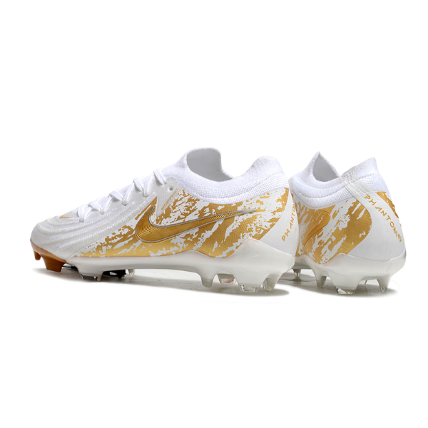 Botas de fútbol Nike Phantom GX2 Elite FG para terreno firme, color blanco y dorado