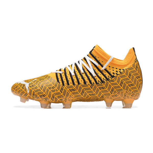 Botas de fútbol Puma Future Z 1.3 Manchester City Pack negras y amarillas para terreno firme FG