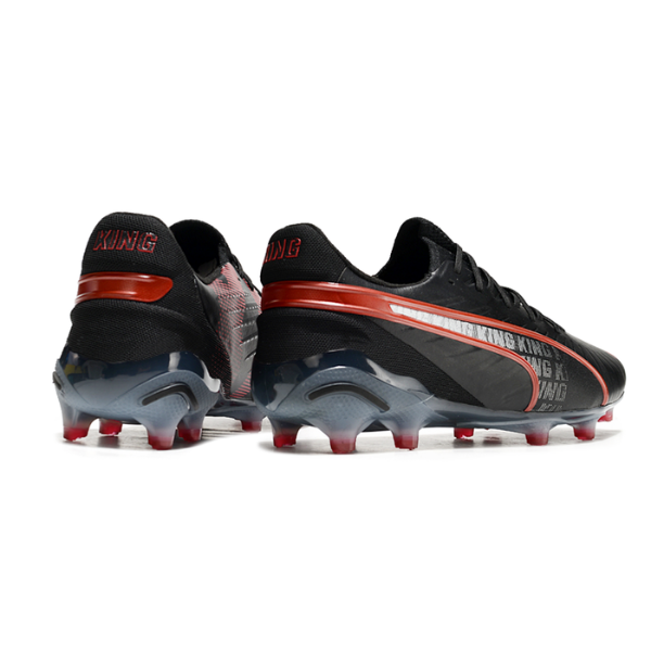 Botas de fútbol Puma King Ultimate FG para terreno firme, color negro y rojo
