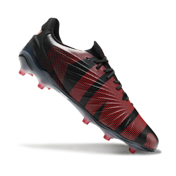 Botas de fútbol Puma King Ultimate FG para terreno firme, color negro y rojo