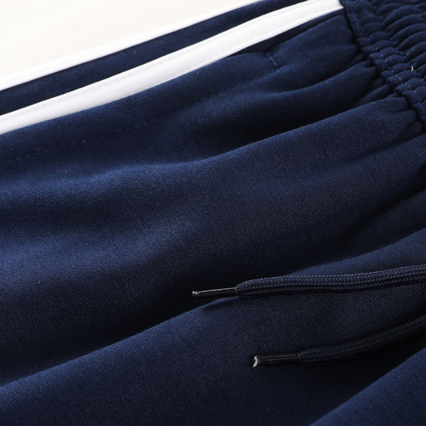 Conjunto de abrigo y pantalón azul frío de Adidas 