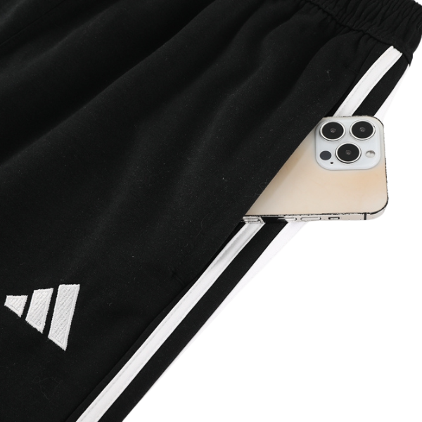 Conjunto Adidas Cold Set con abrigo y pantalones en blanco y negro 