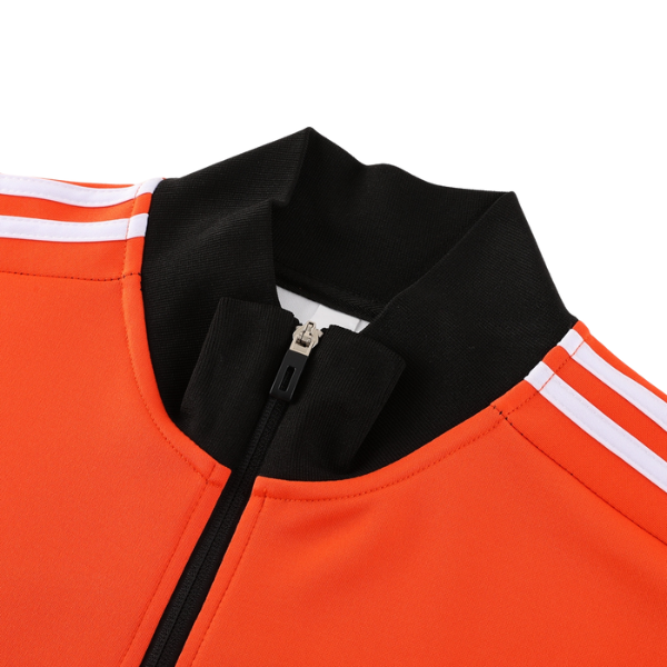 Chaqueta y pantalón Adidas naranja, blanco y negro Cold Set 