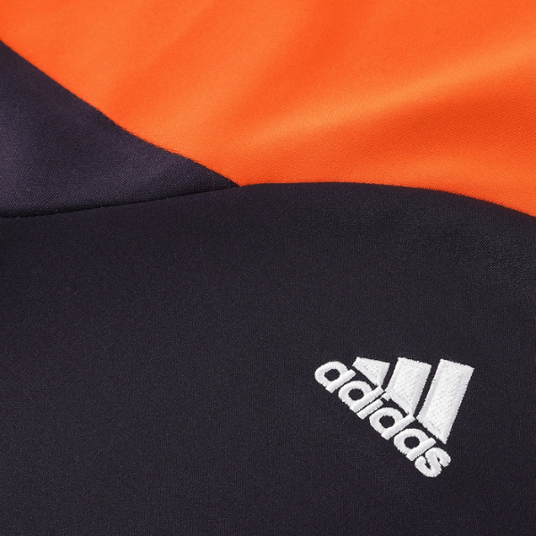 Chaqueta y pantalón Adidas naranja y negro Cold Set 