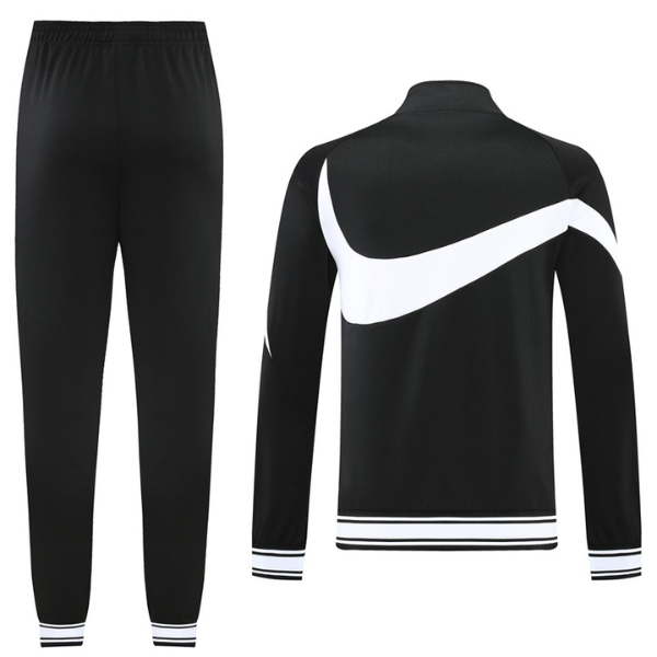 Chaqueta y pantalones Nike Cold Set en blanco y negro