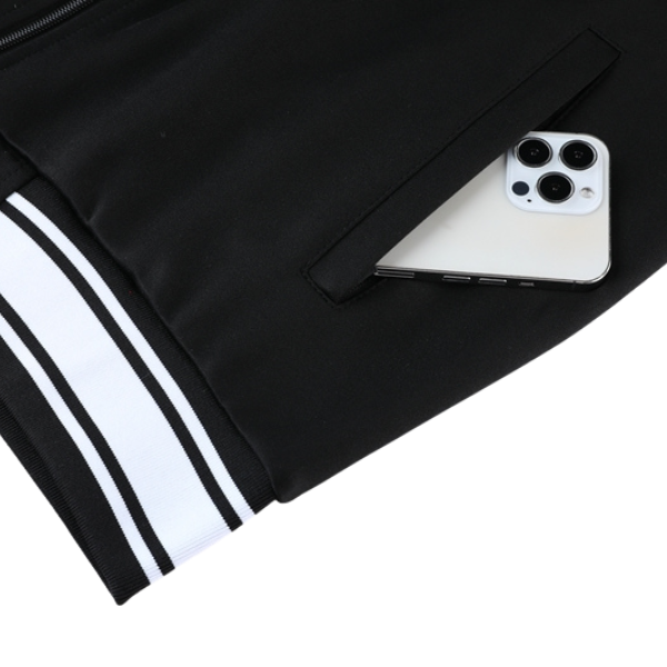 Chaqueta y pantalones Nike Cold Set en blanco y negro