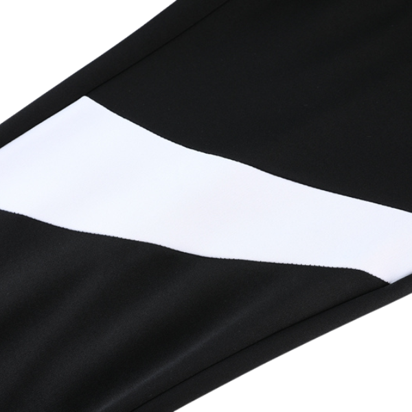 Chaqueta y pantalones Nike Cold Set en blanco y negro