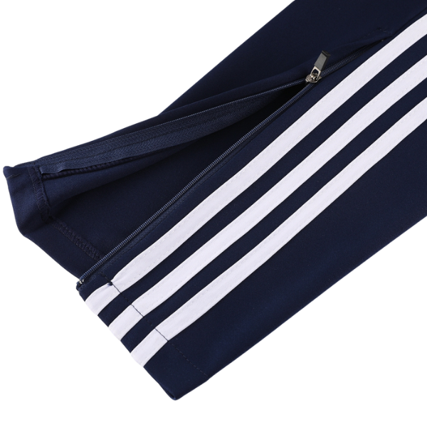 Conjunto de camiseta y pantalones Adidas azul oscuro Cold Set con cremallera de un cuarto