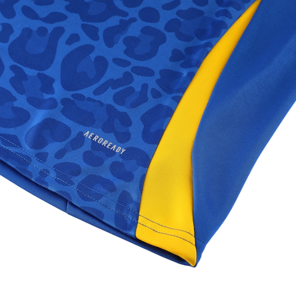 Camiseta y pantalones Adidas Cold Set azul, amarillo y negro con cremallera de un cuarto