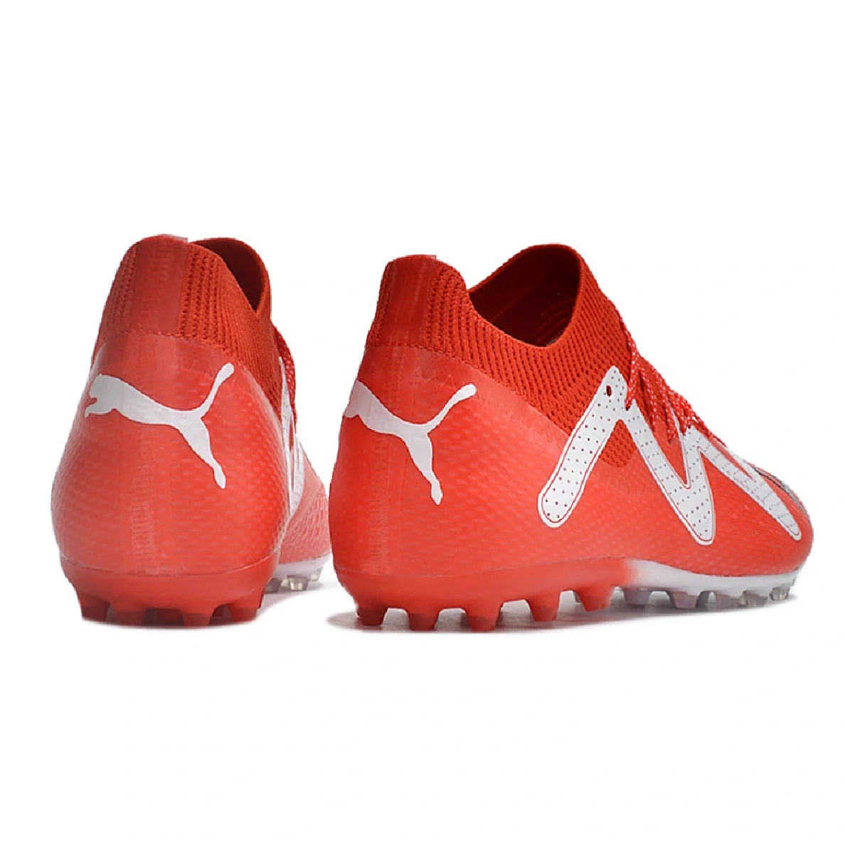 Botas de fútbol Puma Future Ultimate MG multisuperficie en rojo y blanco