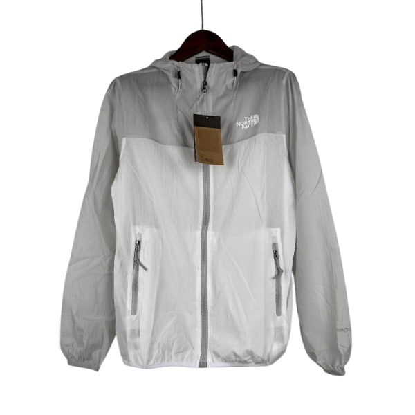 Chaqueta cortavientos gris blanca de The North Face