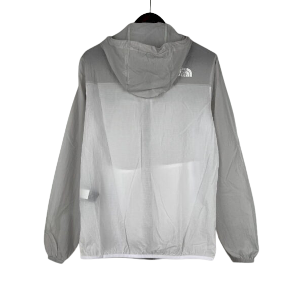 Chaqueta cortavientos gris blanca de The North Face