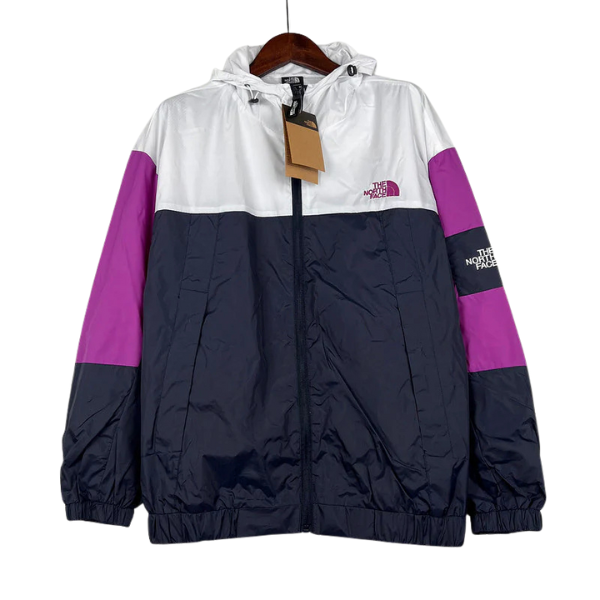 Chaqueta cortavientos The North Face blanca, rosa y azul